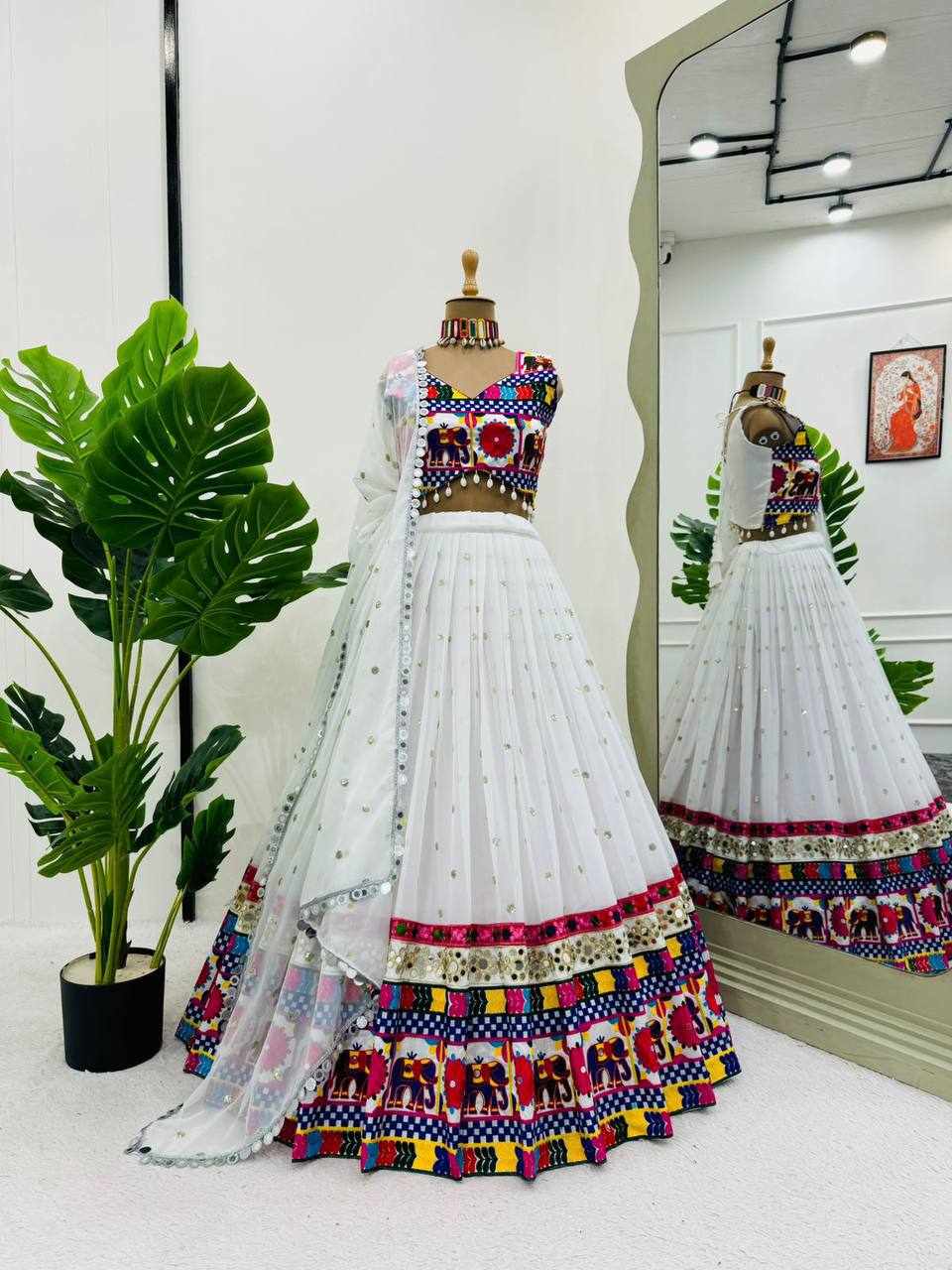 White Faux Georgette Mirror Work Lehenga Choli for Navratri
