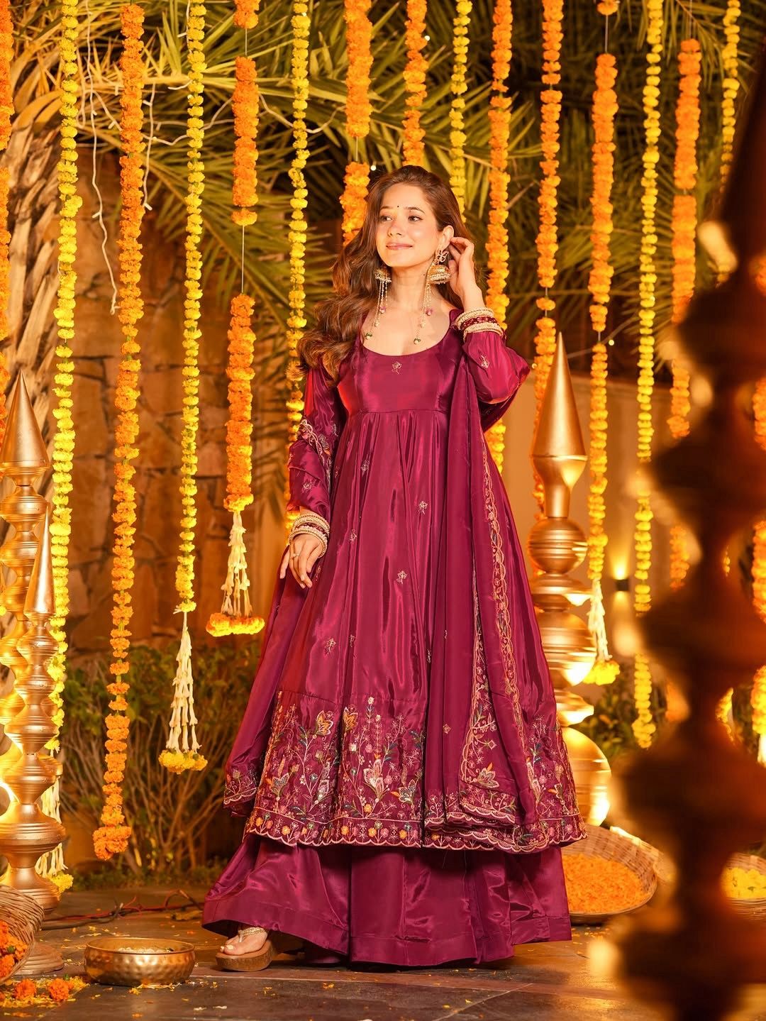 Elegant maroon Anarkali suit with floral embroidery, perfect for Indian festivals and weddings.