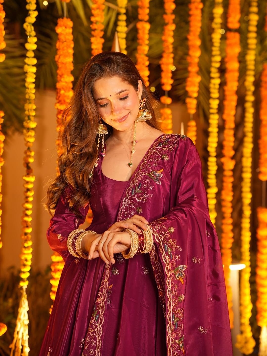 Elegant maroon Anarkali suit with floral embroidery, perfect for Indian festivals and weddings