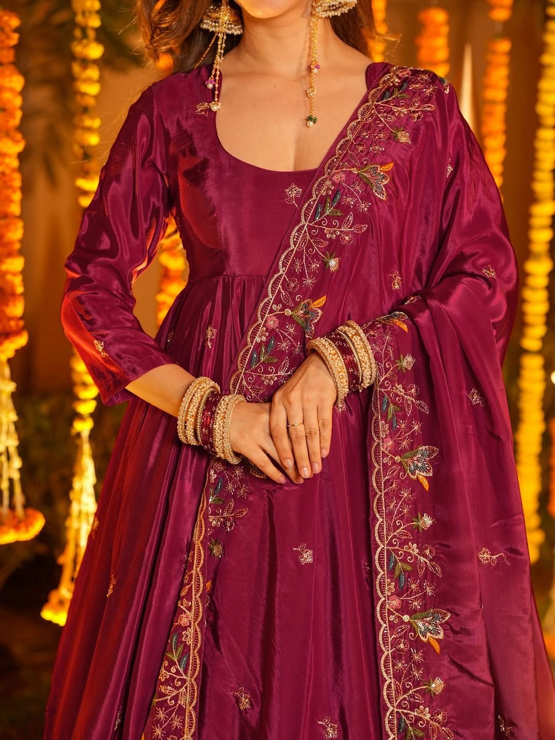 Elegant maroon Anarkali suit with floral embroidery, perfect for Indian festivals and weddings
