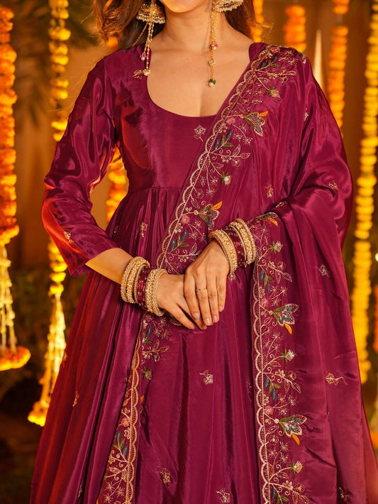 Elegant maroon Anarkali suit with floral embroidery, perfect for Indian festivals and weddings
